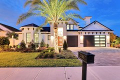 Luxury home model - front view at dusk
