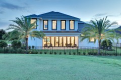 Rear view of model luxury home - Heritage Green