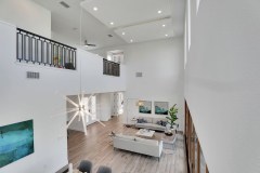 View of living room from staircase - ABD Development luxury home.