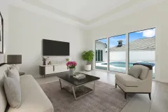 Living-Room-with-view-of-Courtyard-and-Pool-Virtually-Staged