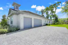 Palm-Coast-Courtyard-Home-3-Car-Garage