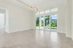 Palm-Coast-Courtyard-Home-Dining-Room-and-Lanai